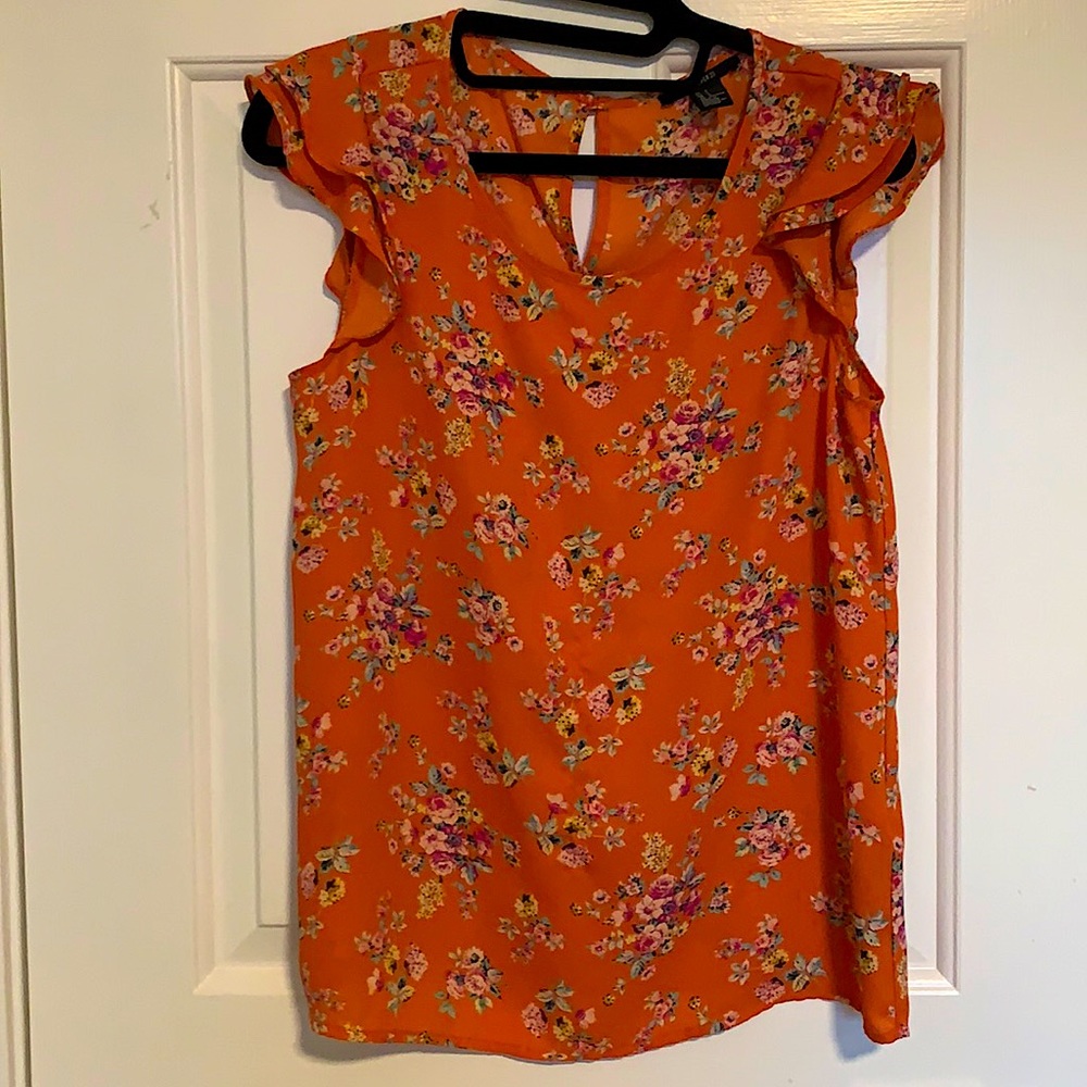 Floral top with flutter sleeves